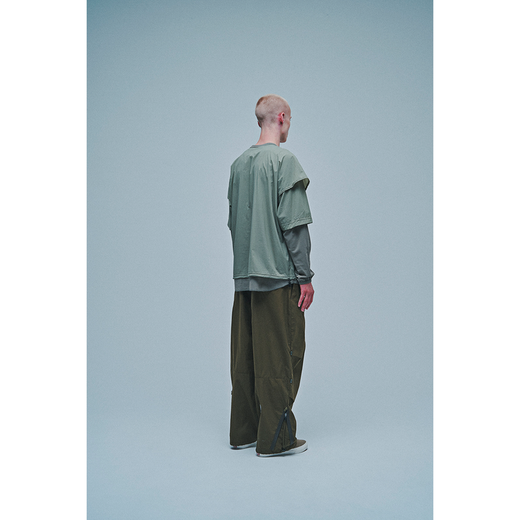 THE CHANGING LENGTH/HEM WIDE ZIP UP TUCKED PANTS