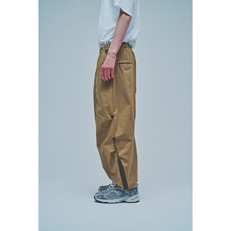 THE CHANGING LENGTH/HEM WIDE ZIP UP TUCKED PANTS