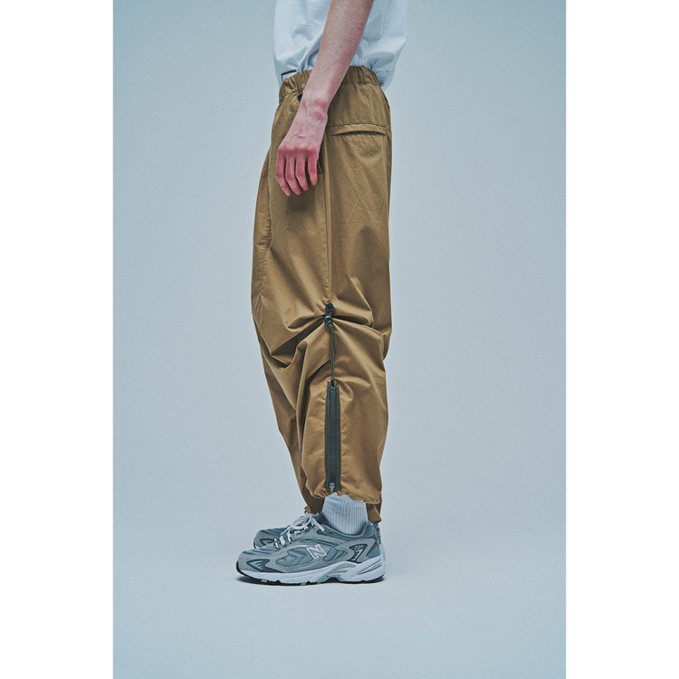 THE CHANGING LENGTH/HEM WIDE ZIP UP TUCKED PANTS