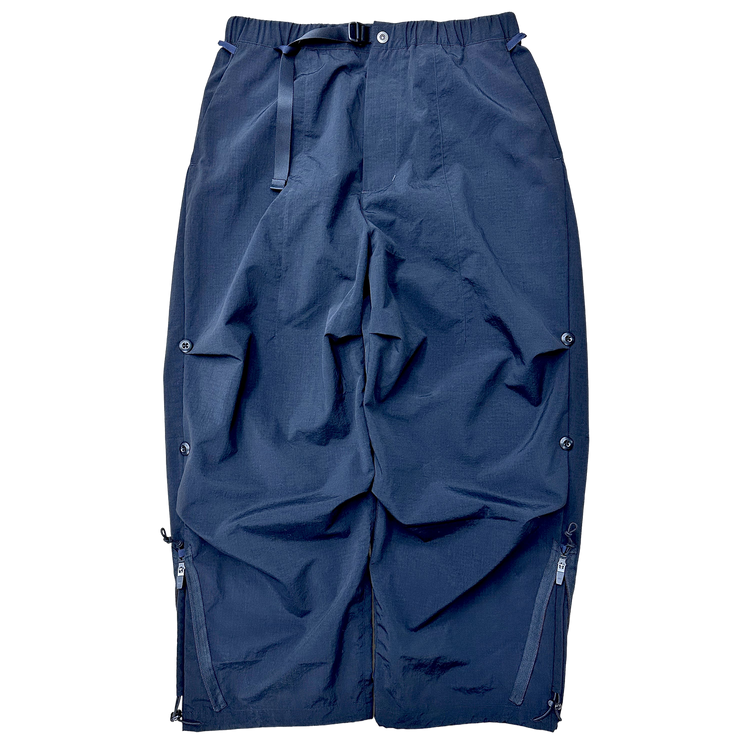 THE CHANGING LENGTH/HEM WIDE ZIP UP TUCKED PANTS