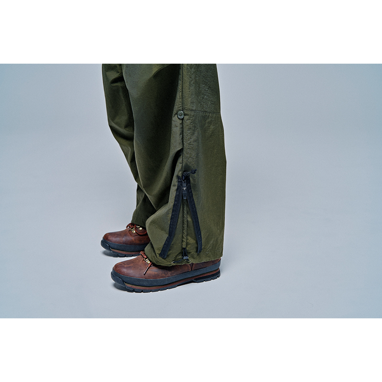 THE CHANGING LENGTH/HEM WIDE ZIP UP TUCKED PANTS