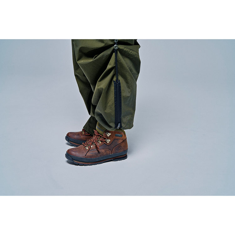 THE CHANGING LENGTH/HEM WIDE ZIP UP TUCKED PANTS